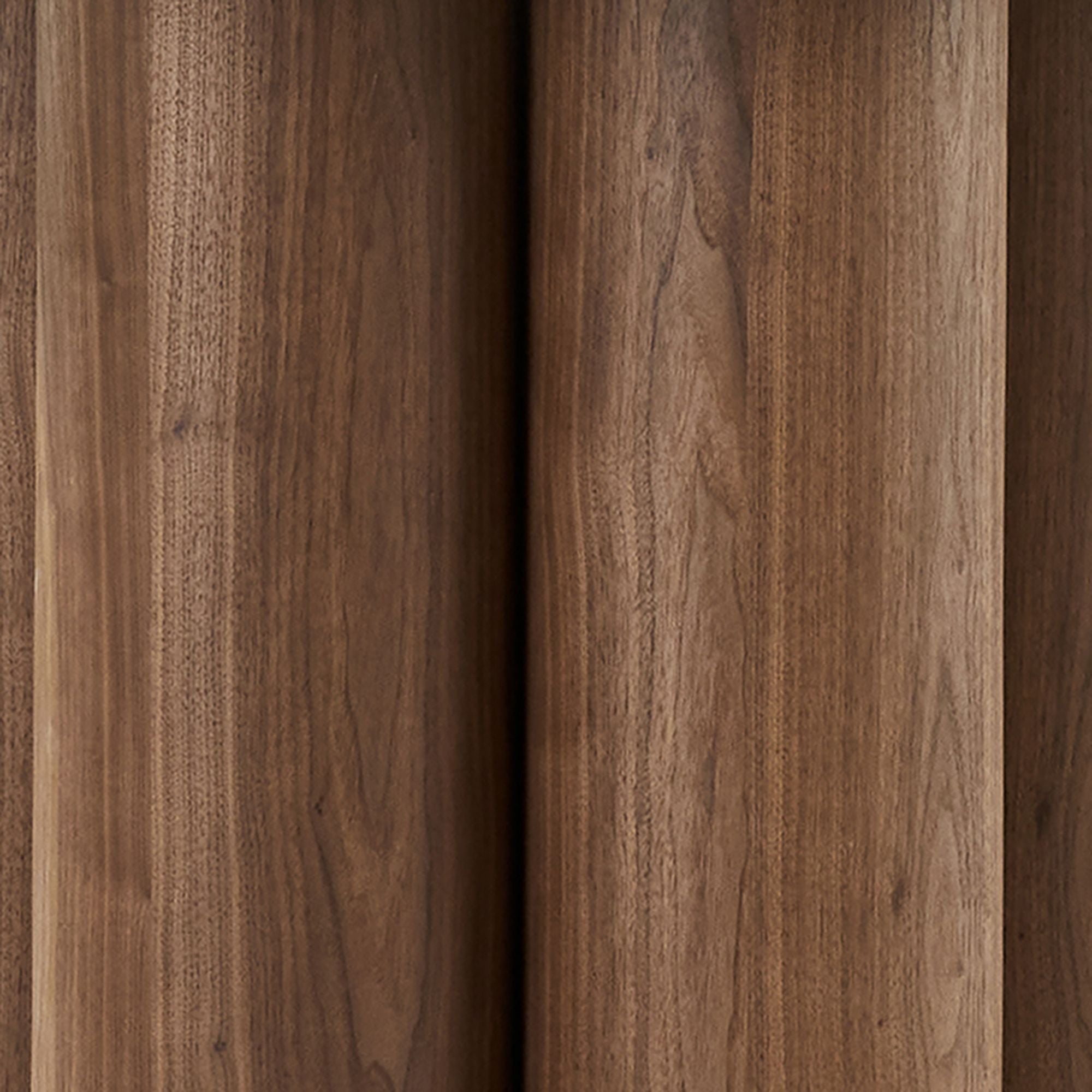 Close-up of wooden planks with a focus on texture and color variation.