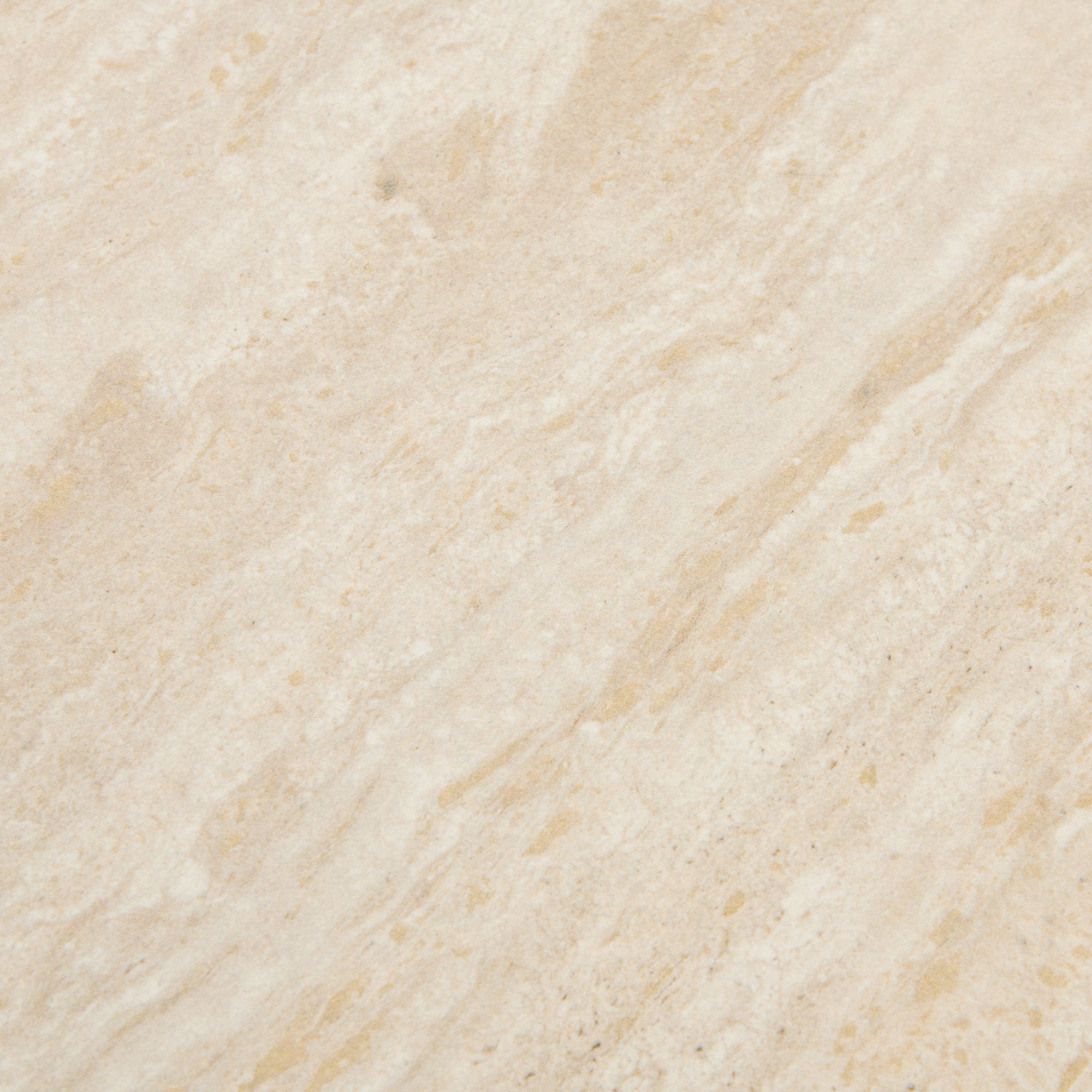 Over-head macro view of the sintered stone top highlighting the intricate tan and cream patterns that mimic natural travertine stone.
