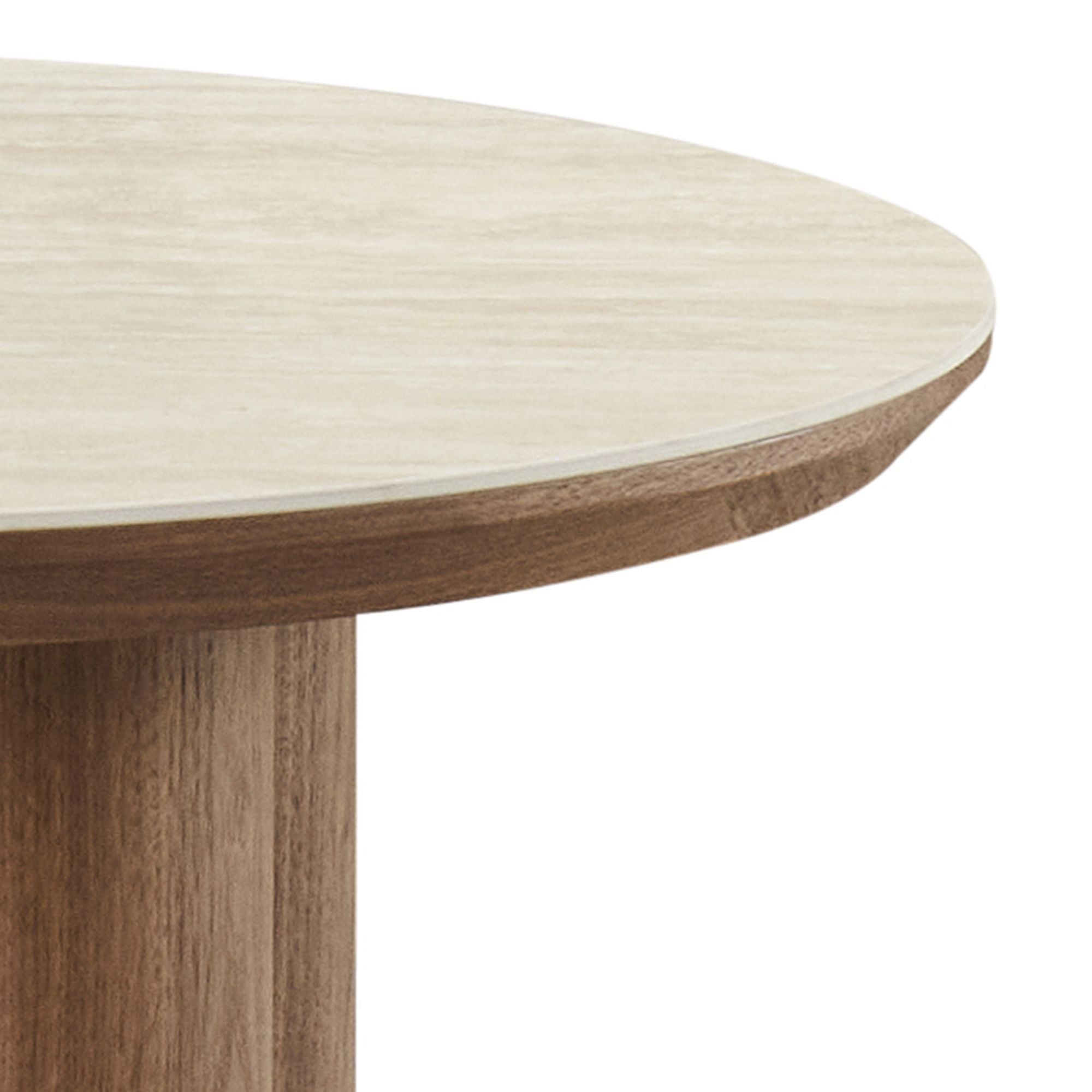 Macro shot of the Lyric coffee table edge showing the seamless transition between the sintered stone top and the tapered walnut frame.