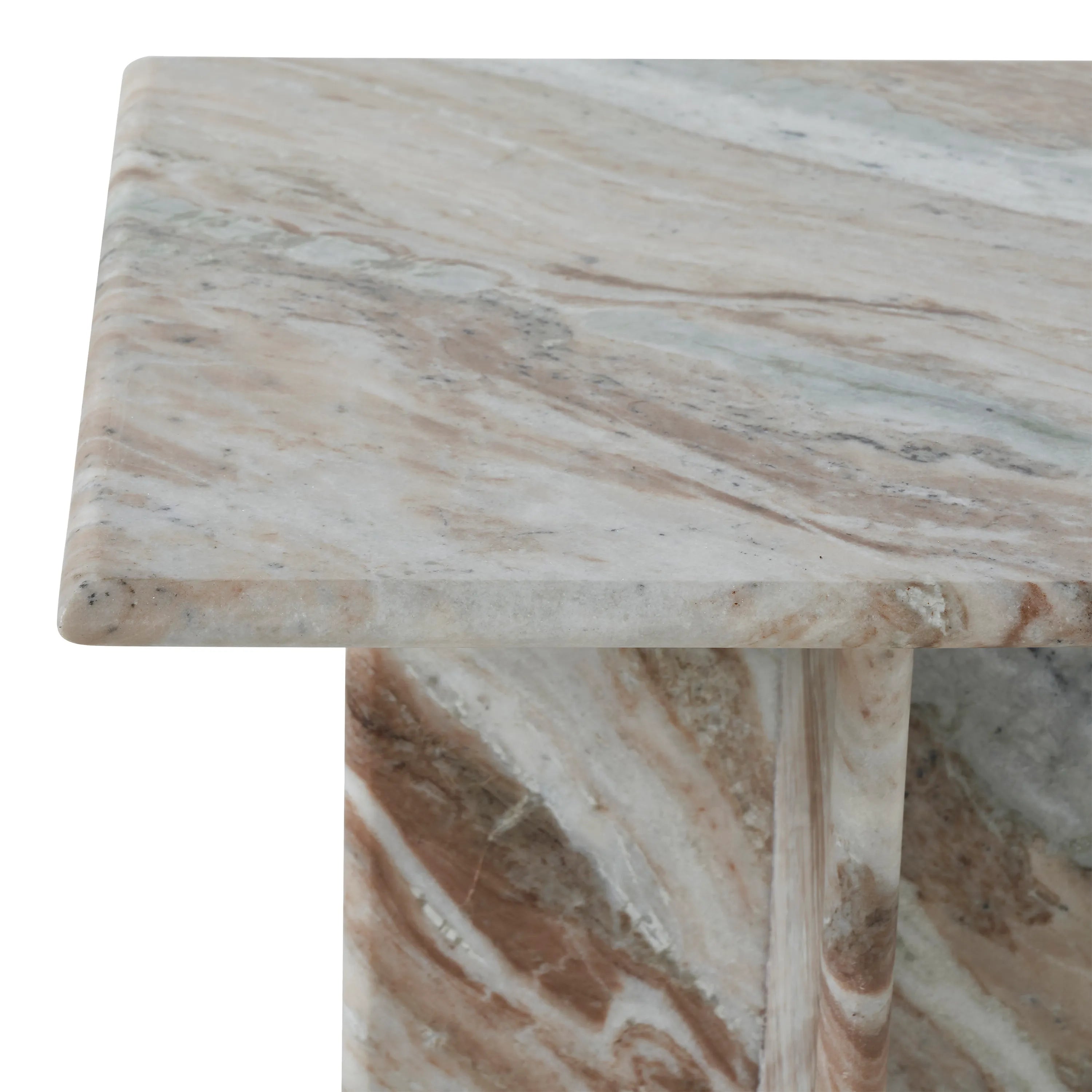 Close up of the Mesa marble side table corner, highlighting the smooth honed edge and the natural variations in the stone pattern.