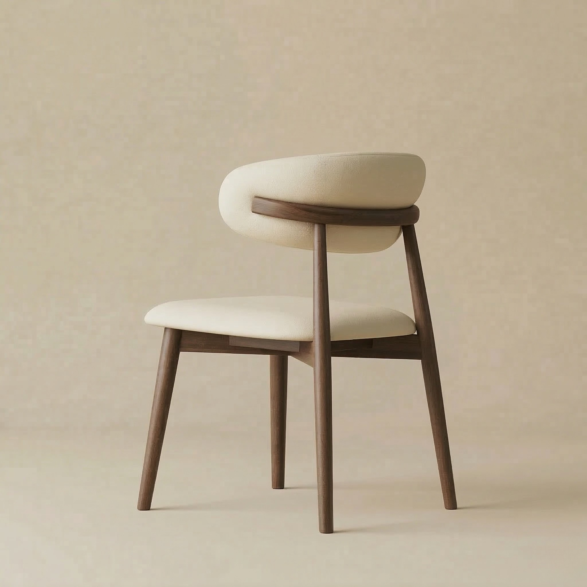 Back view of the Modern Leather Ash Wood Dining Chair revealing the elegant solid wood support bar that holds the upholstered backrest.