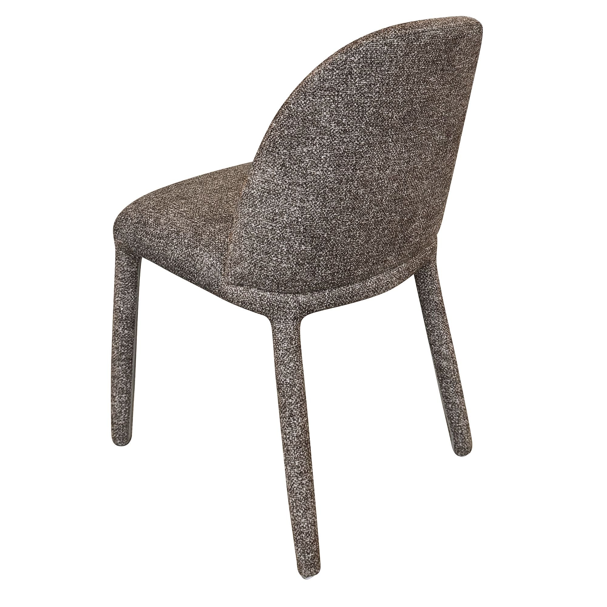 Angled back view of the Myla fully upholstered dining chair in a rich, speckled dark brown fabric.