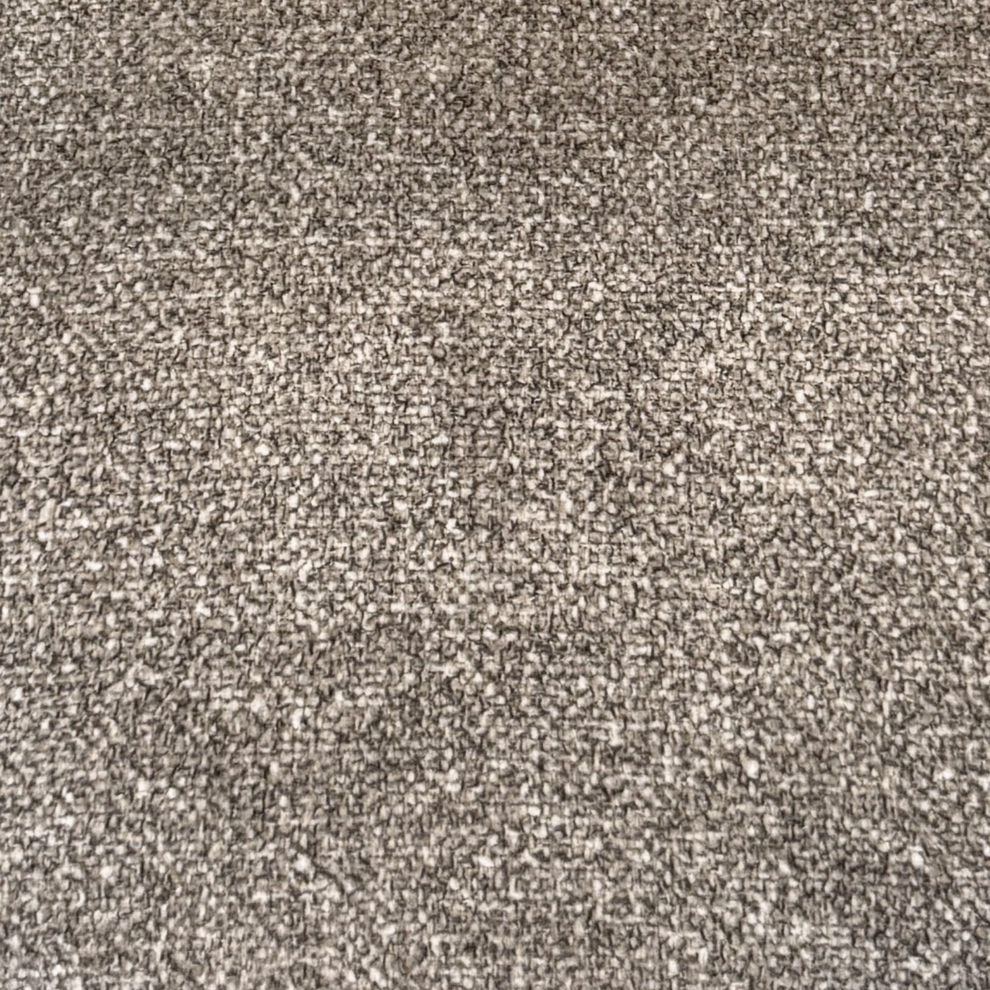 Macro close-up of the soft, speckled dark brown textured fabric on the Myla dining chair.