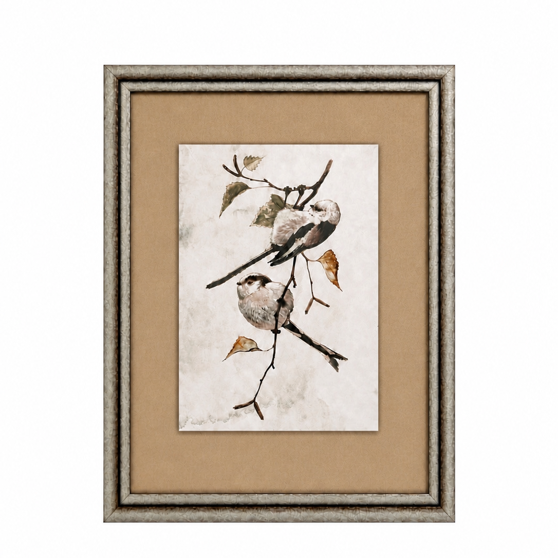 Framed artwork of birds on a branch with a beige background