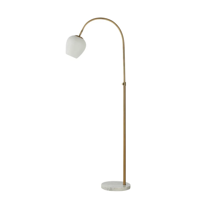 Noemi floor lamp shown in full with its antique brass arc frame and white marble base.