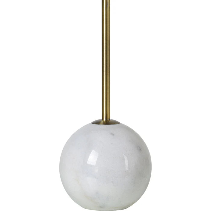 Macro close-up of the Nox lamp base showcasing the polished white marble texture and natural tan veining.