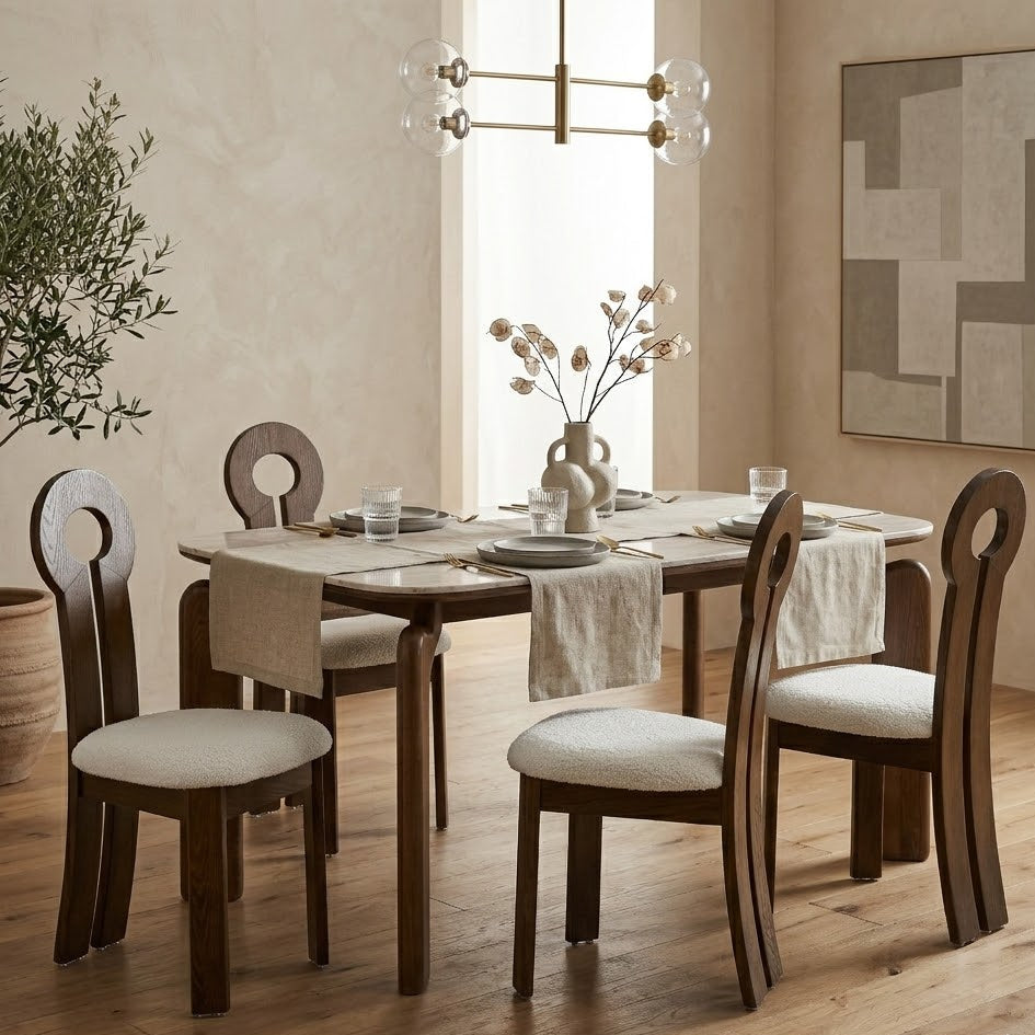 Dining room with Eclipse Elegance Dining Table and Obsidian Loop Dining Chairs on a wooden floor
