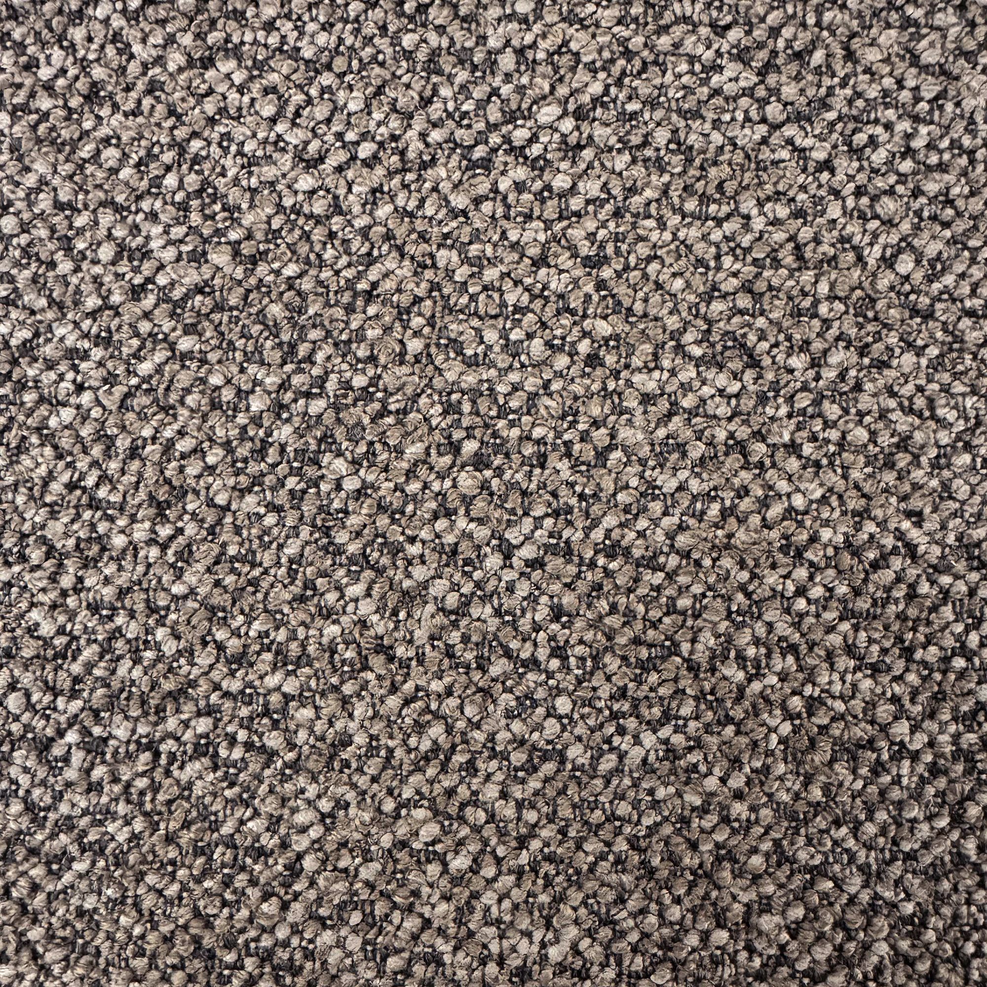 Macro close-up of the Odette chair's premium multi-tonal charcoal bouclé fabric highlighting its rich, nubby texture.