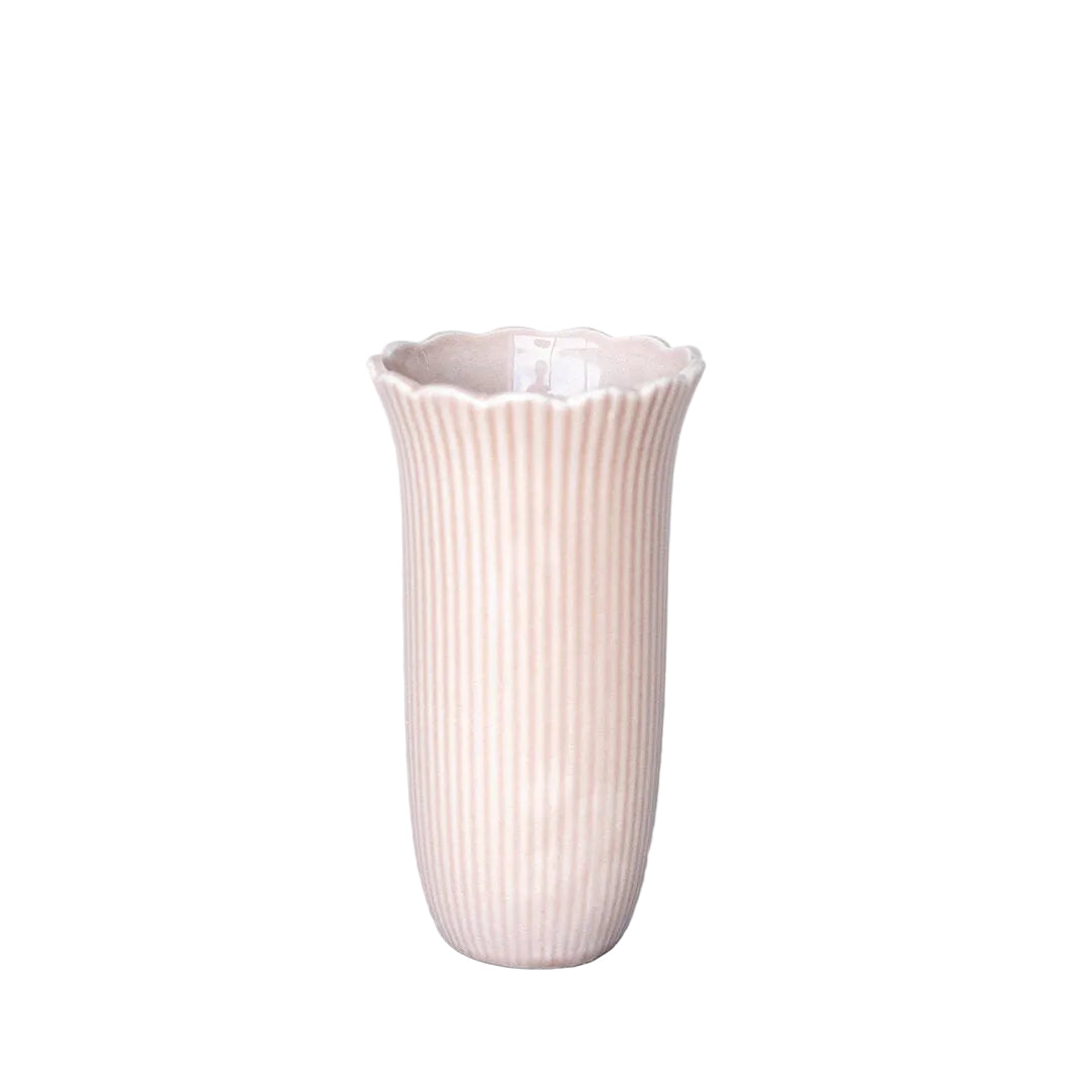 White ribbed vase on a light gray background
