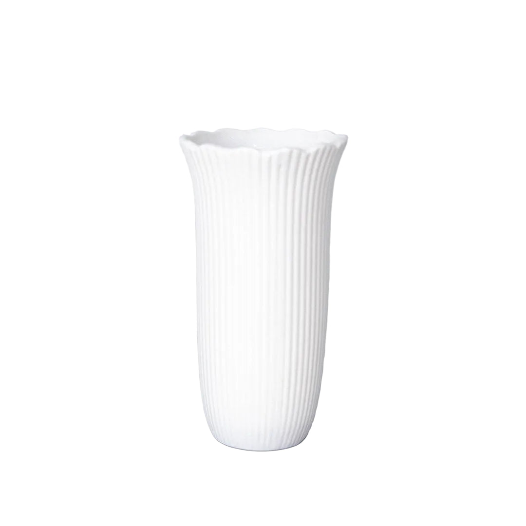 White ribbed vase on a light gray background