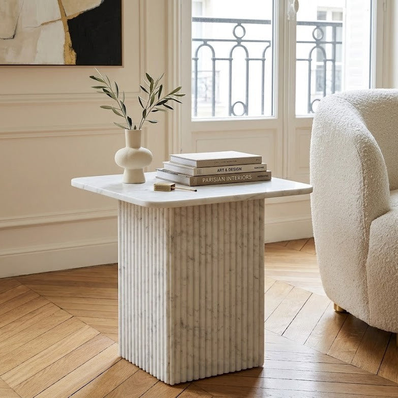 Lifestyle view of the Ophelia Marble Accent Table in a modern living room