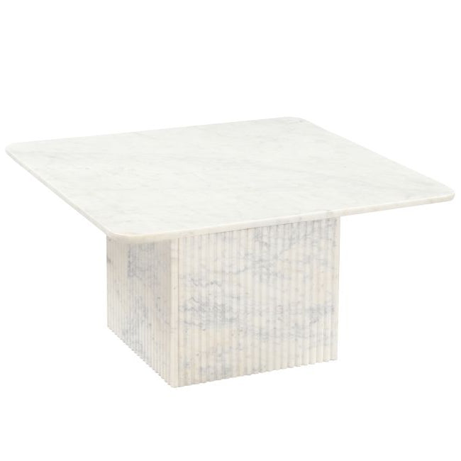 Square marble table with a marble top and fluted base on a white background