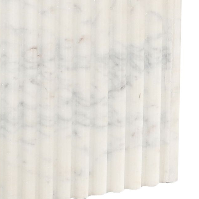 Close-up details of the fluted base of the Ophelia Marble Coffee Table
