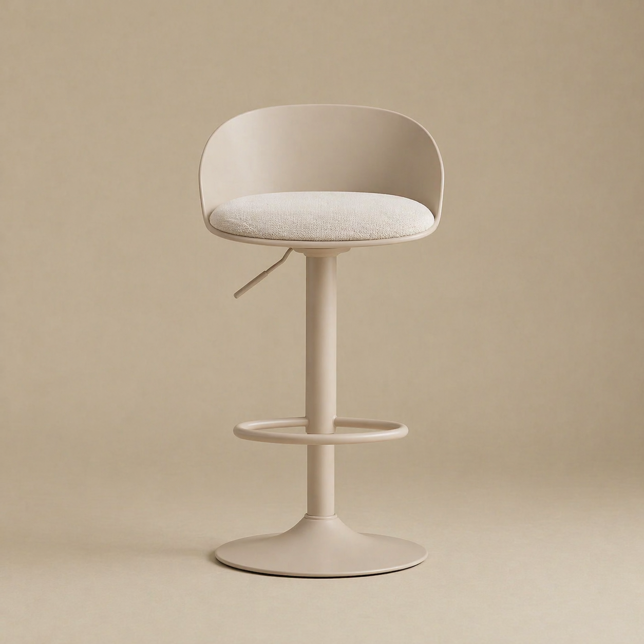 Beige bar stool with a cushioned seat on a beige background