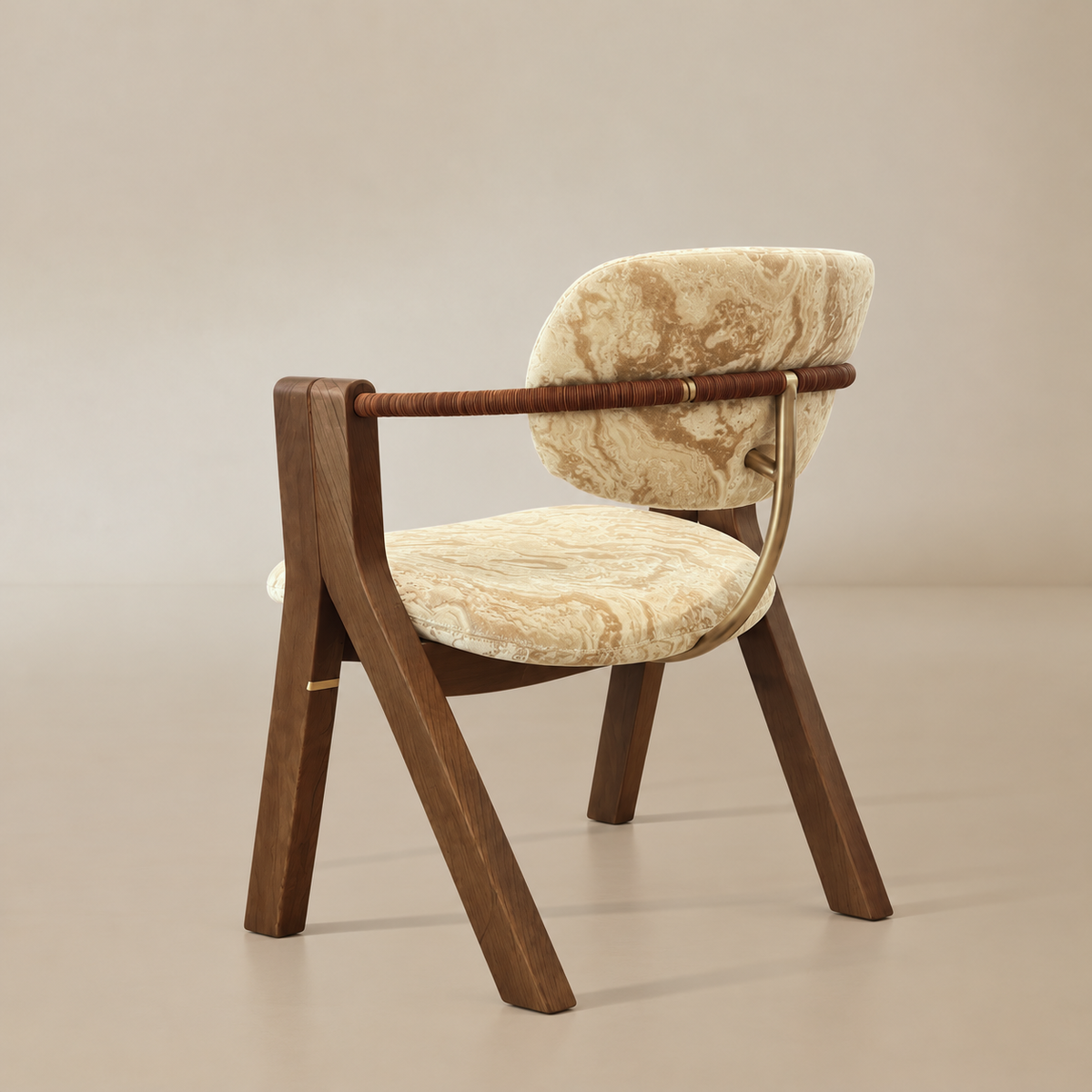 Rear three-quarter view showing the patterned velvet backrest, wrapped arm rail, brass-toned back support, and angled wood legs.