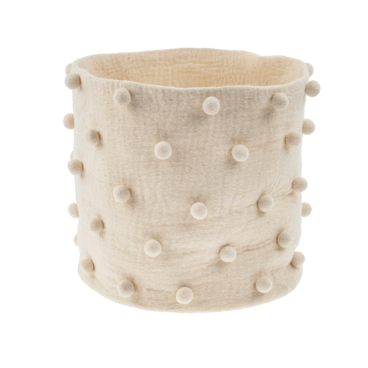 Beige woven basket with white pom-poms on a white background