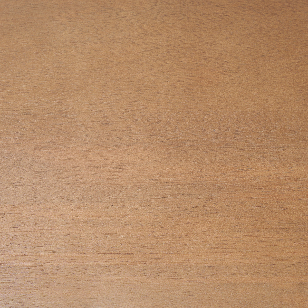 Close-up of the warm medium brown finish and natural wood grain on the Rowan arched bookcase.