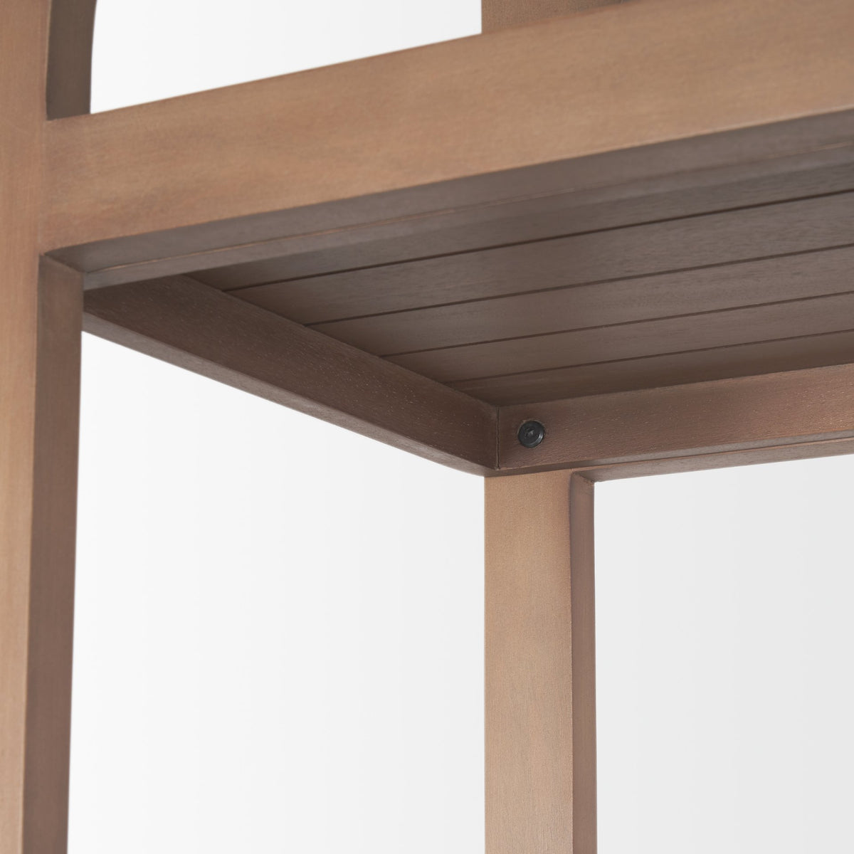 Close-up detail showing the under-shelf construction and secure frame assembly of the Rowan arched bookcase.