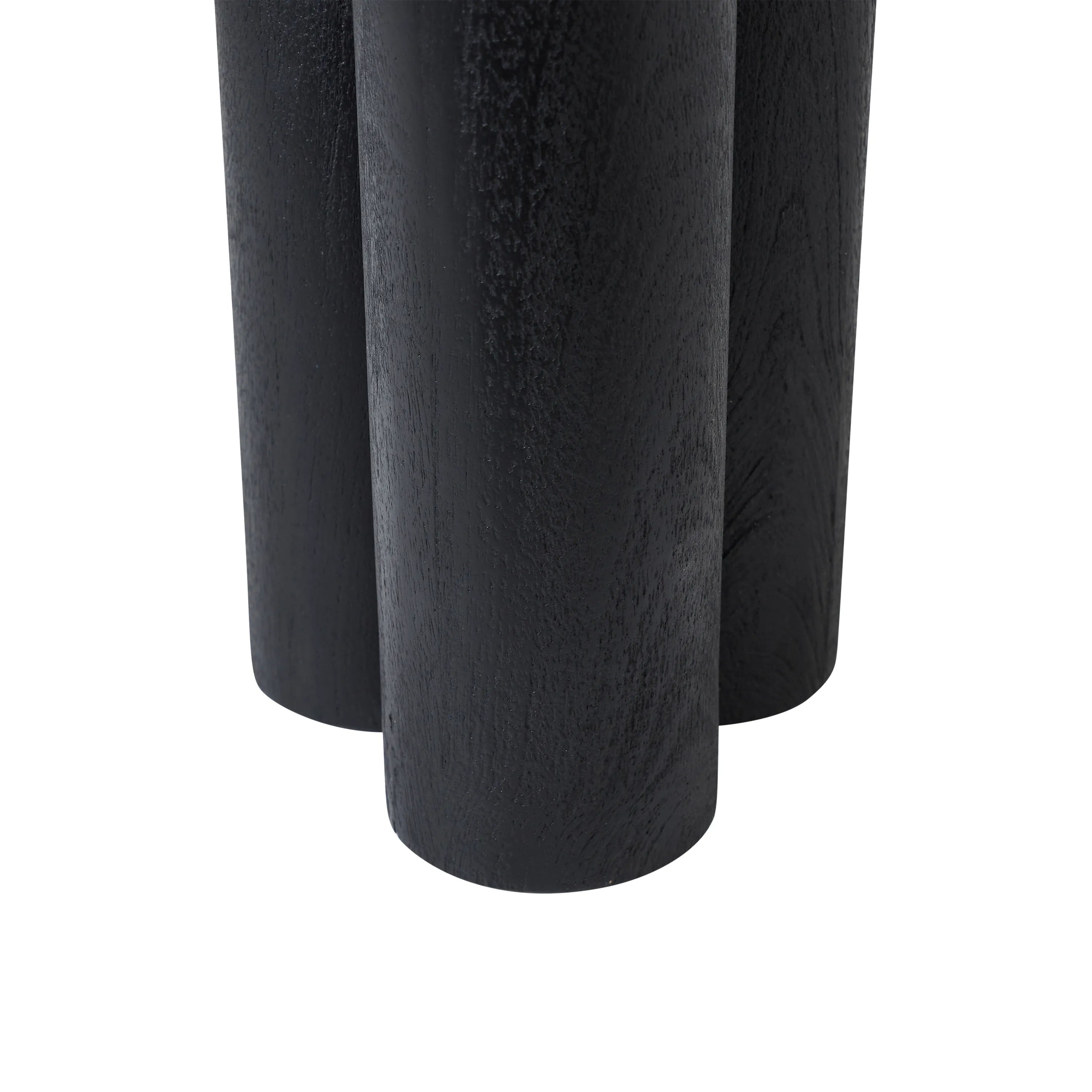 Detail view of the base of the black Ryn side table, showing the thick cylindrical legs and sturdy construction.
