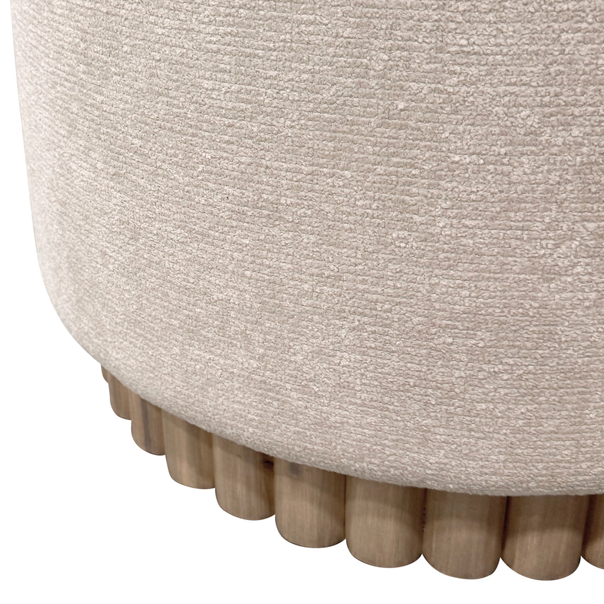 Close-up of a textured beige ottoman with wooden legs on a white background