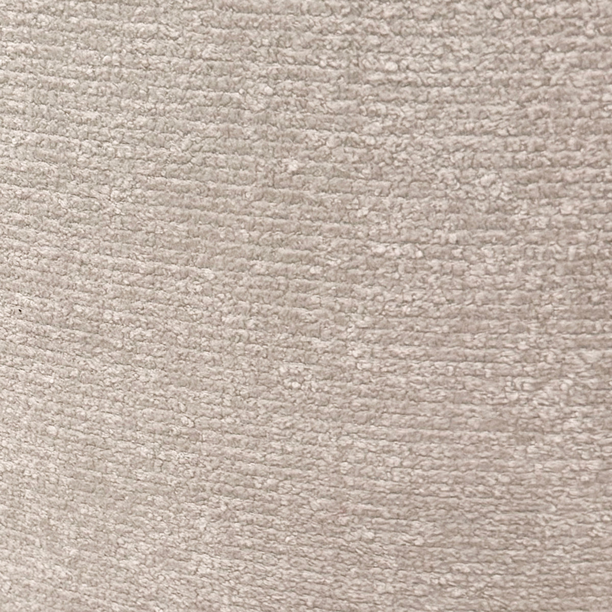 Close-up of a textured oat color chenille fabric surface