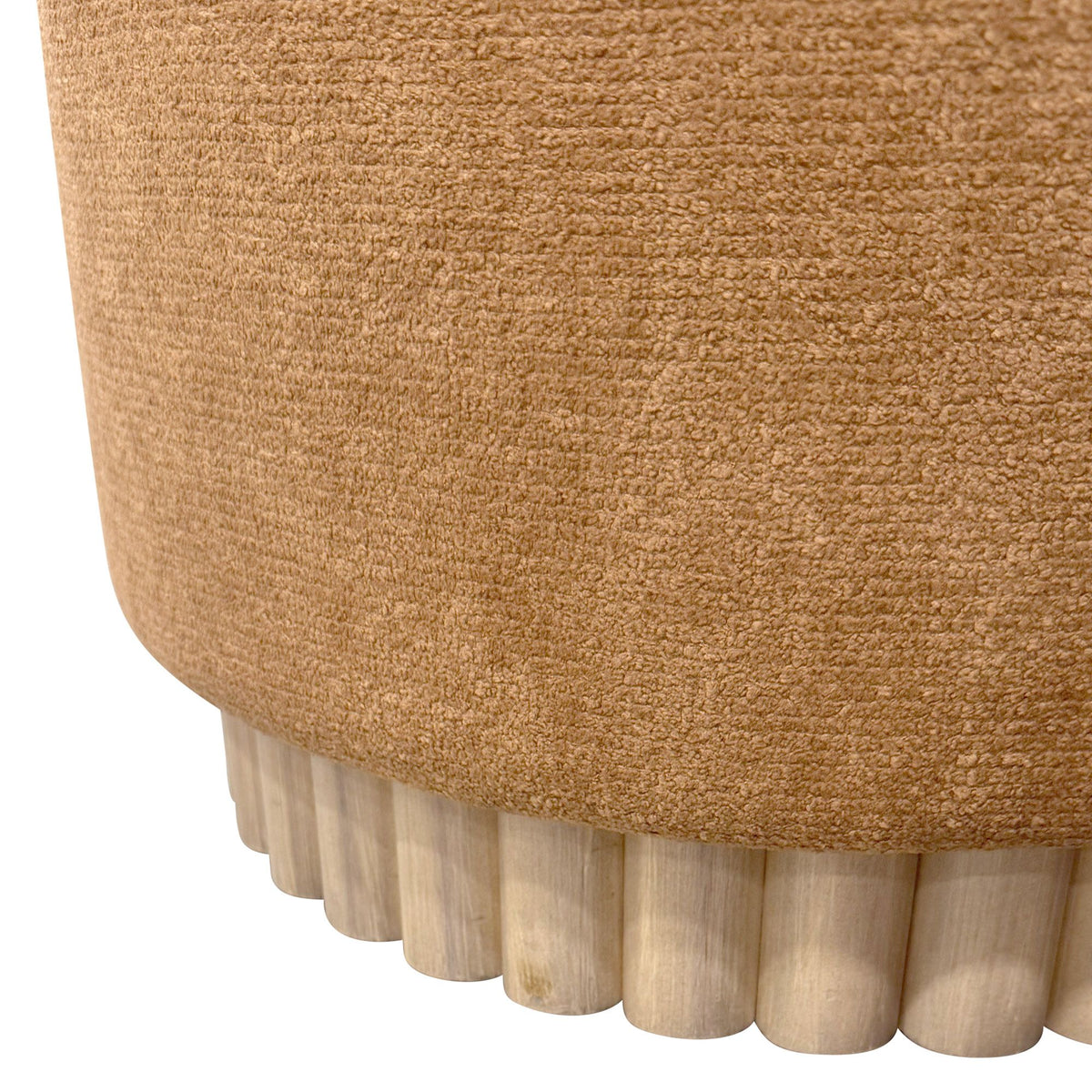 Close-up of a brown textured ottoman with wooden legs on a white background