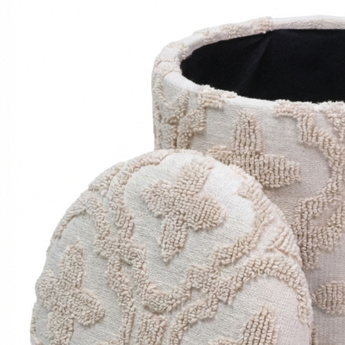 Textured beige ottoman on a white background
