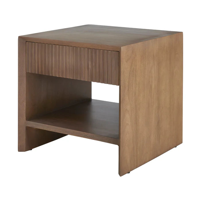 Three-quarter studio view of the Silva nightstand highlighting the smooth mango wood grain and modern block silhouette.