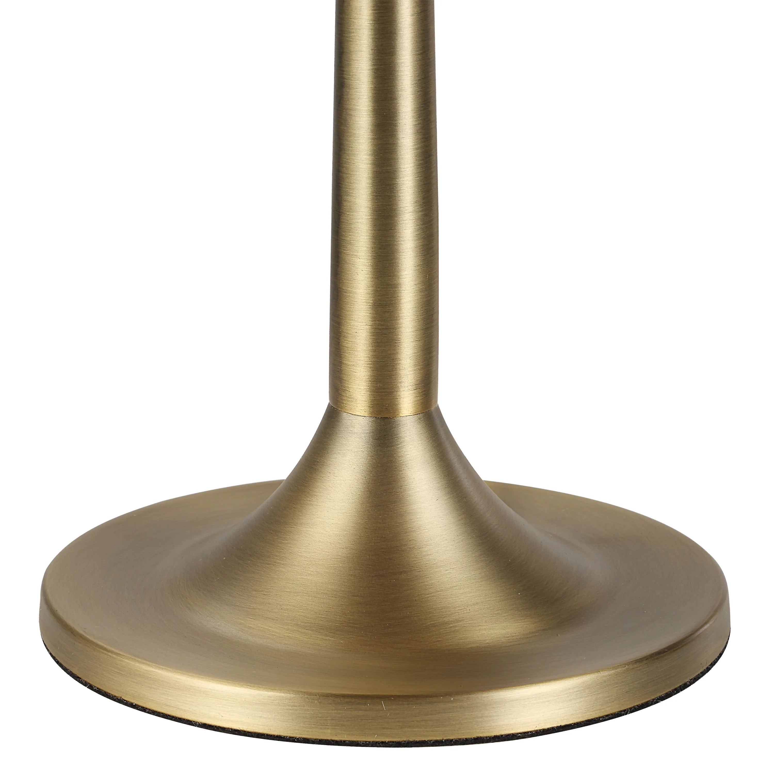 Close-up of Solara Rattan Glow Table Lamp brass base with smooth brushed finish