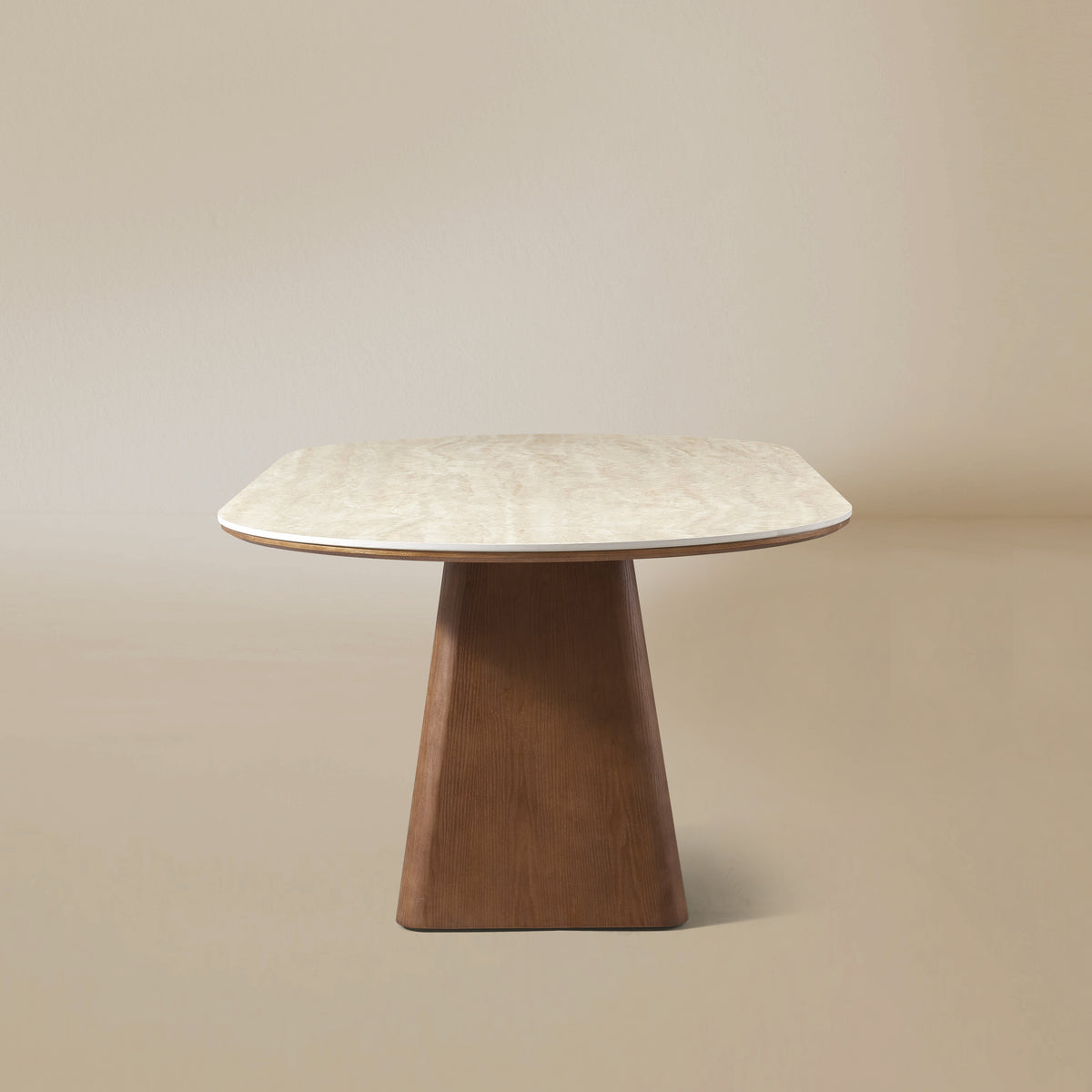 Side view of the Sorella oval dining table with sculptural wood base
