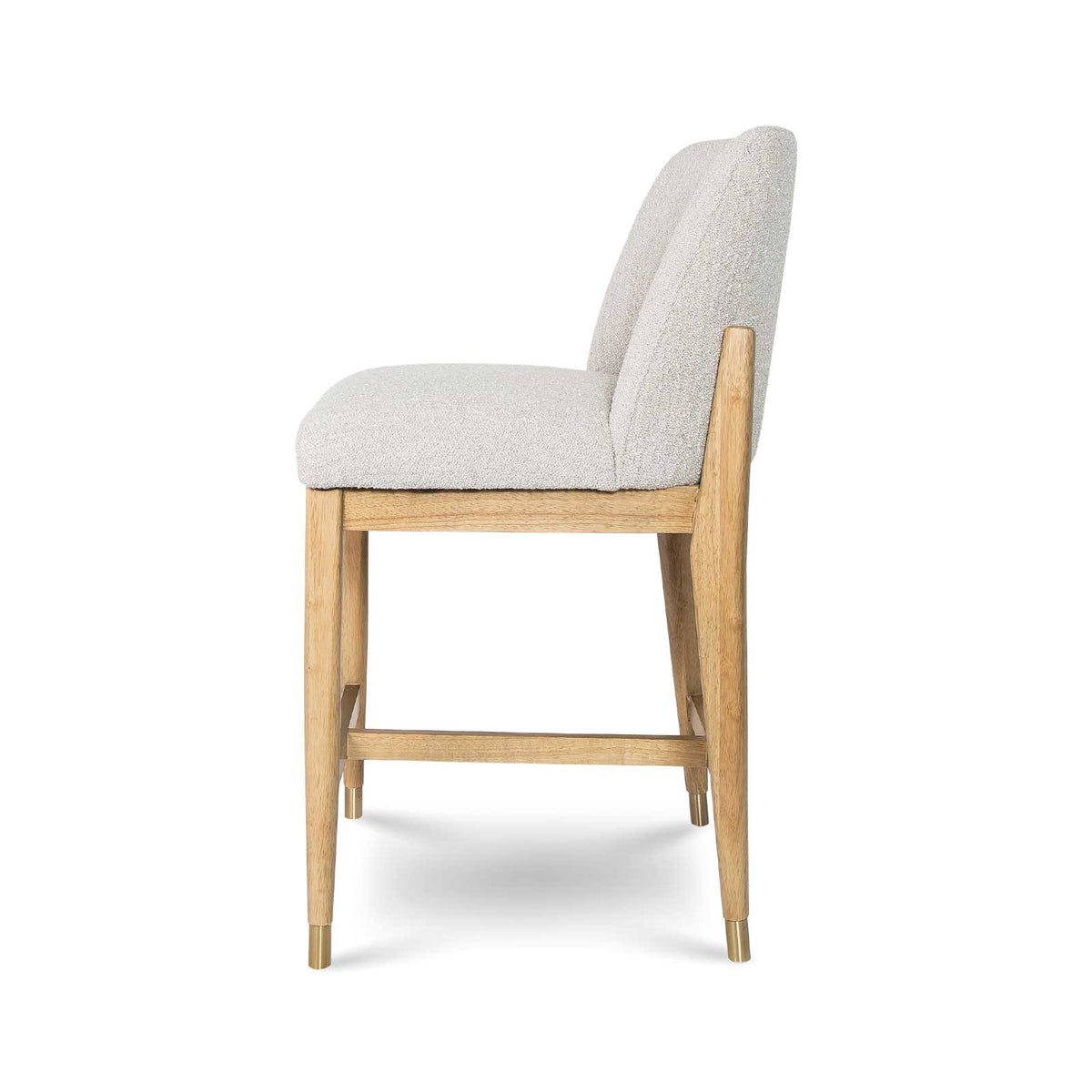 Side profile of the Sterling Counter Stool showing the supportive curved back