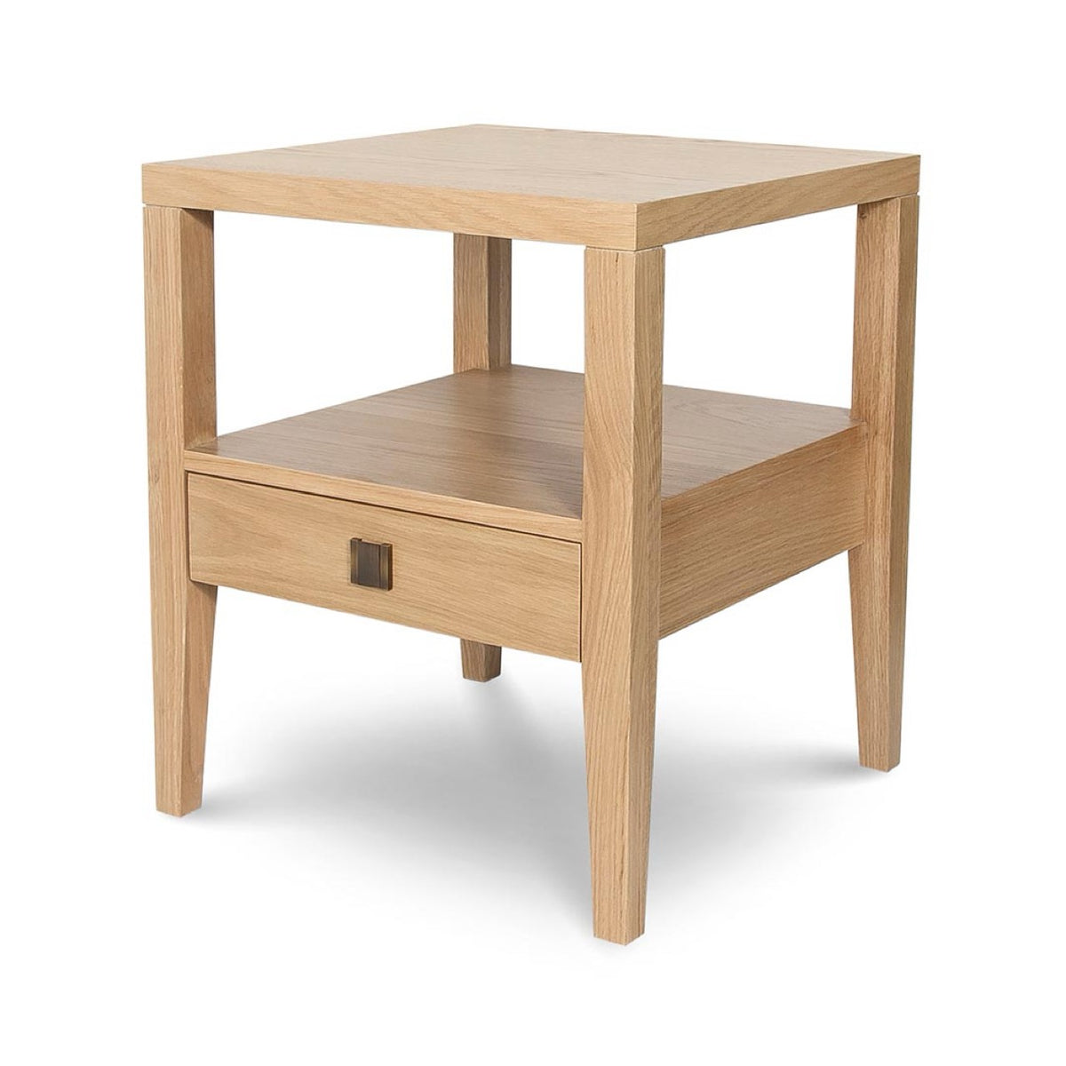 Angled studio view of the Sutton nightstand highlighting its solid wood construction and tapered leg design.