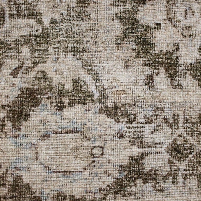 Close-up of a rug with floral pattern in beige and brown tones