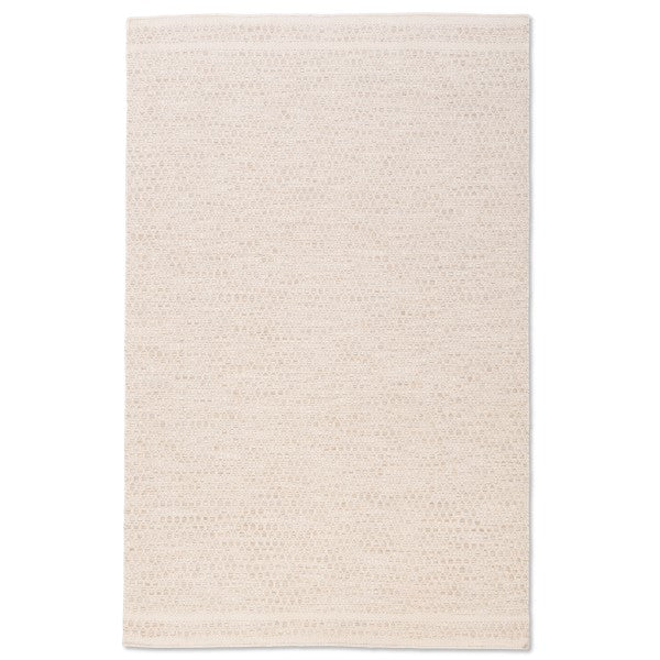 Full top-down view of the Theo hand-woven wool rug in ivory cream, featuring a chunky honeycomb basketweave texture and banded edges.
