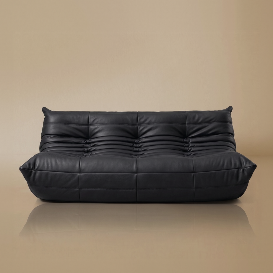 Front view of the TOGO Three Seater Lounger in light beige studio background