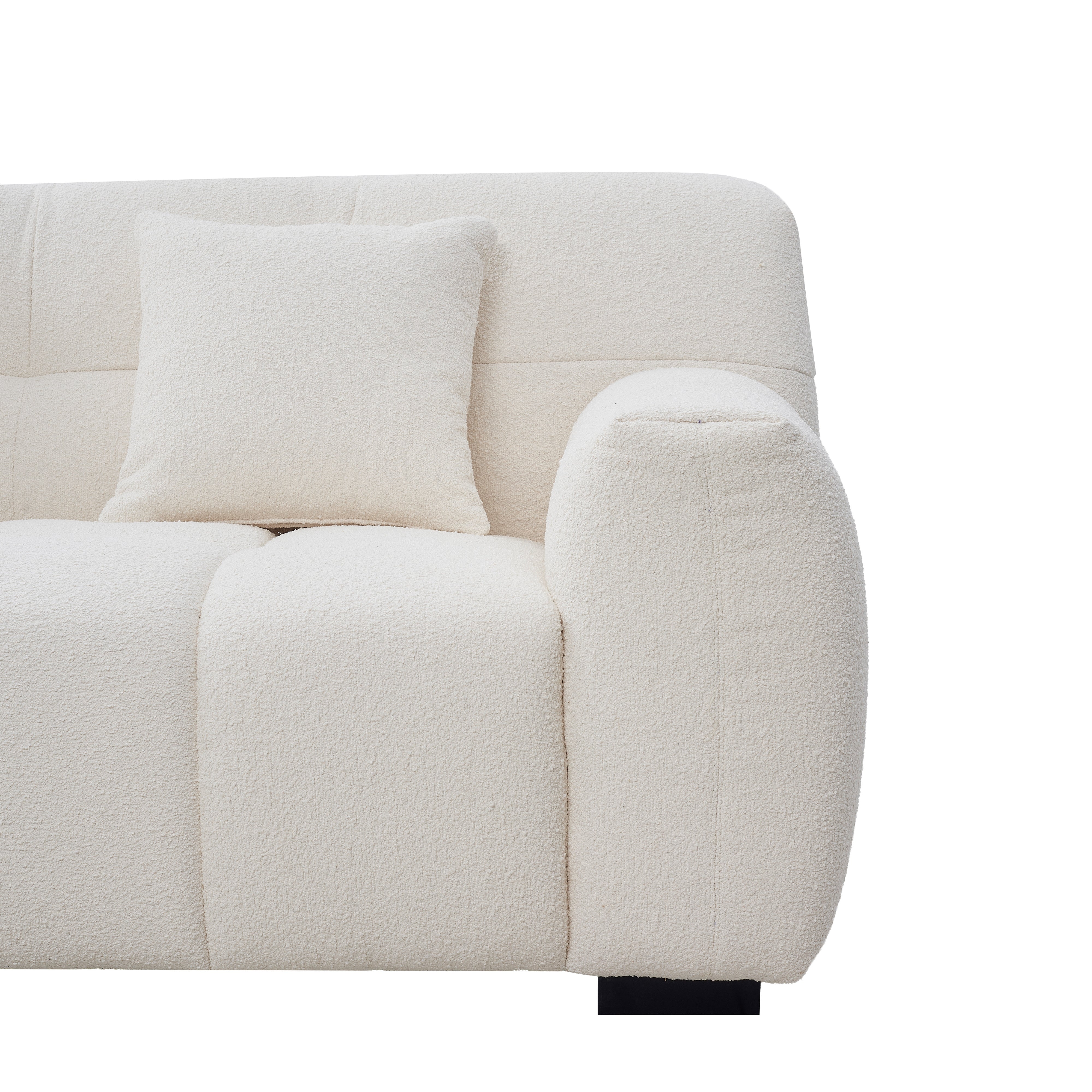 Close-up of the boucle Gummy Sofa armrest on a white background