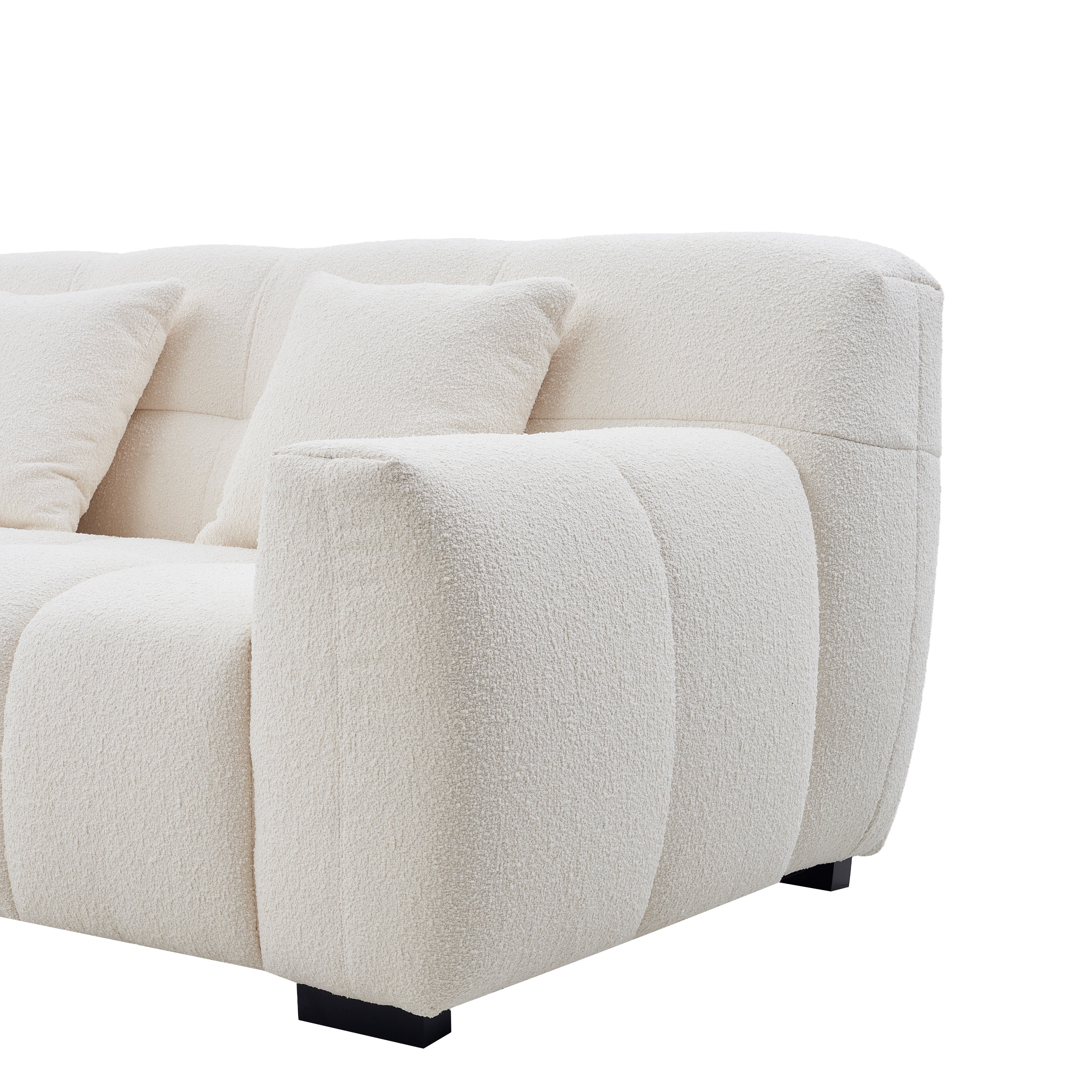 Close-up of a textured boucle Gummy Sofa on a white background