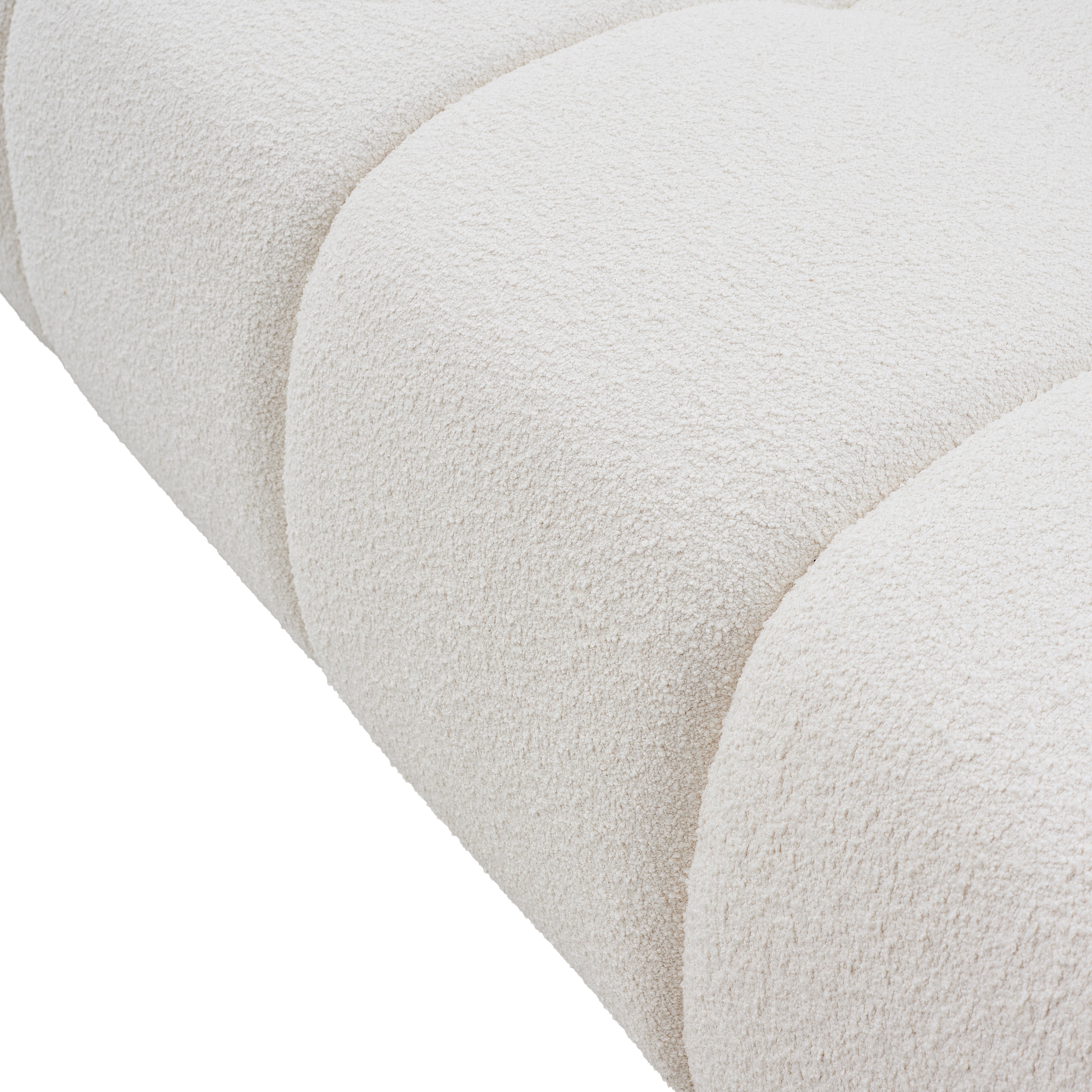 Close-up of a textured boucle fabric on a white background