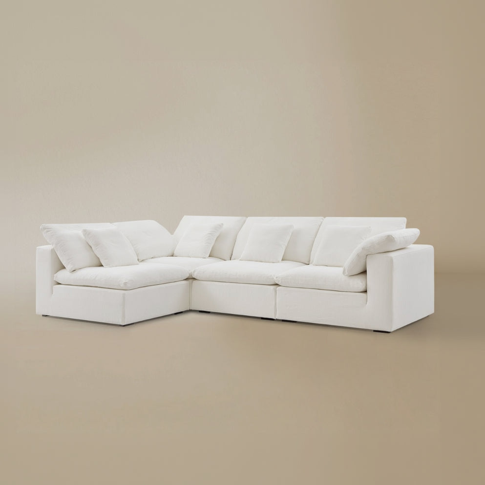 Angled view of the ultra softness modular cloud sofa configured as a three-seater with an armless section.