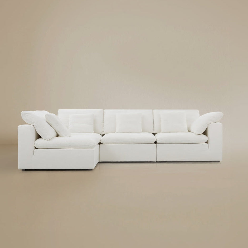 Front view of the ultra softness modular cloud sofa configured as a three-seater with an armless section.