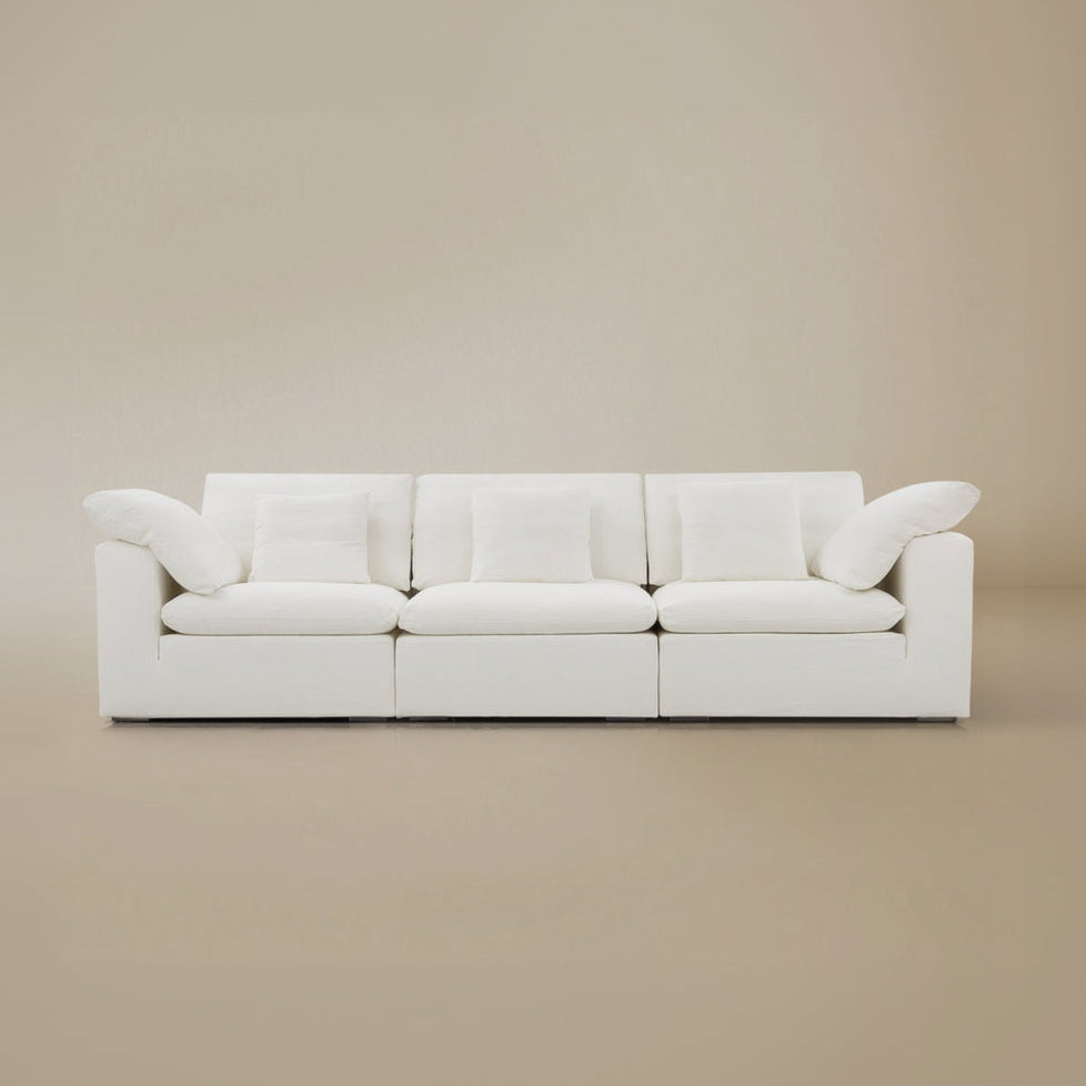 Front view of the three-seater natural linen modular cloud sectional sofa layout.