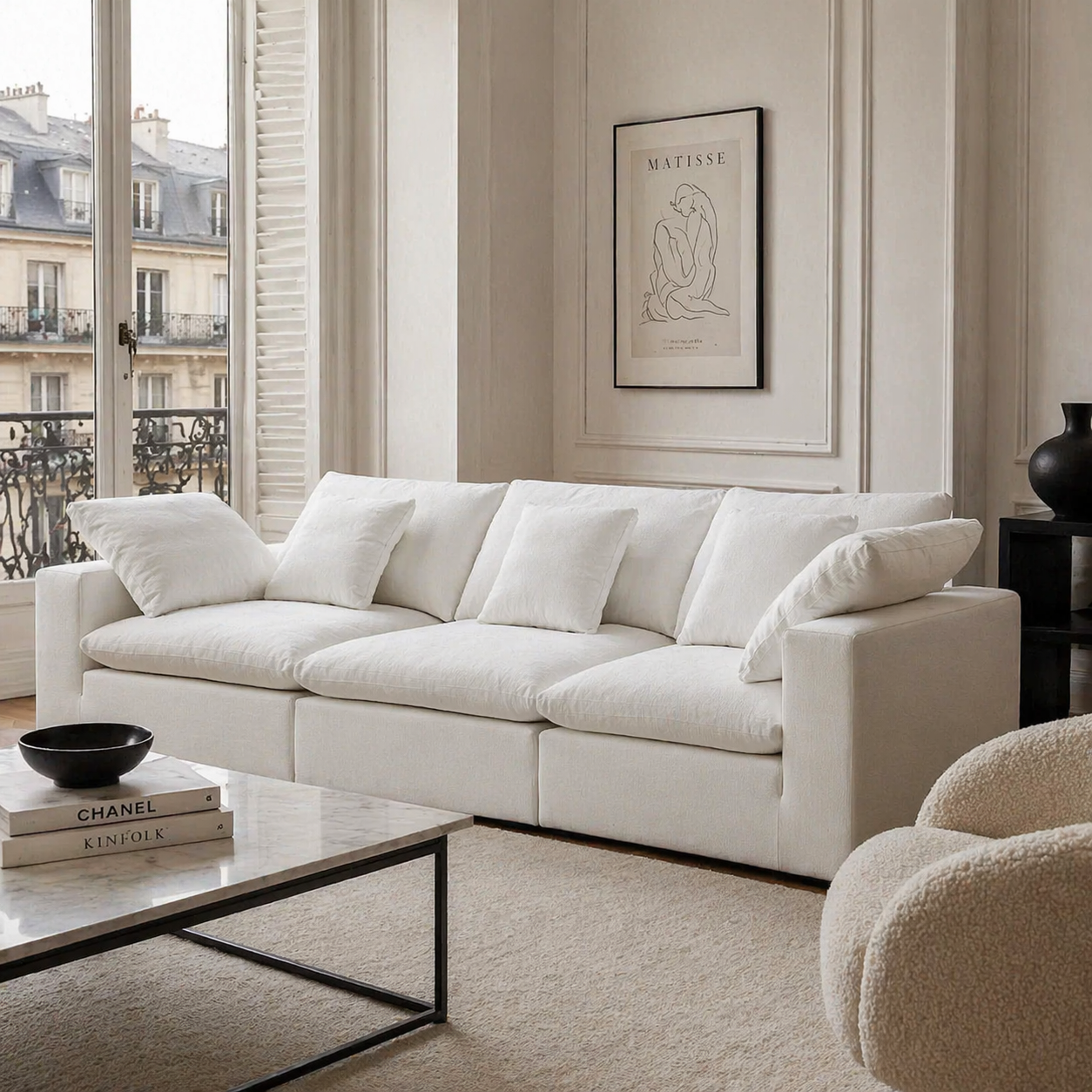 Ultra softness modular cloud sofa lifestyle picture in a Parisian living room setting.