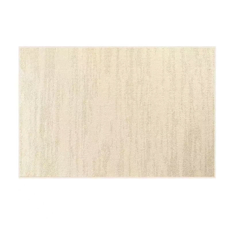 Full overhead view of the rectangular rug showing its warm ivory colour, subtle tonal lines, and textured surface.