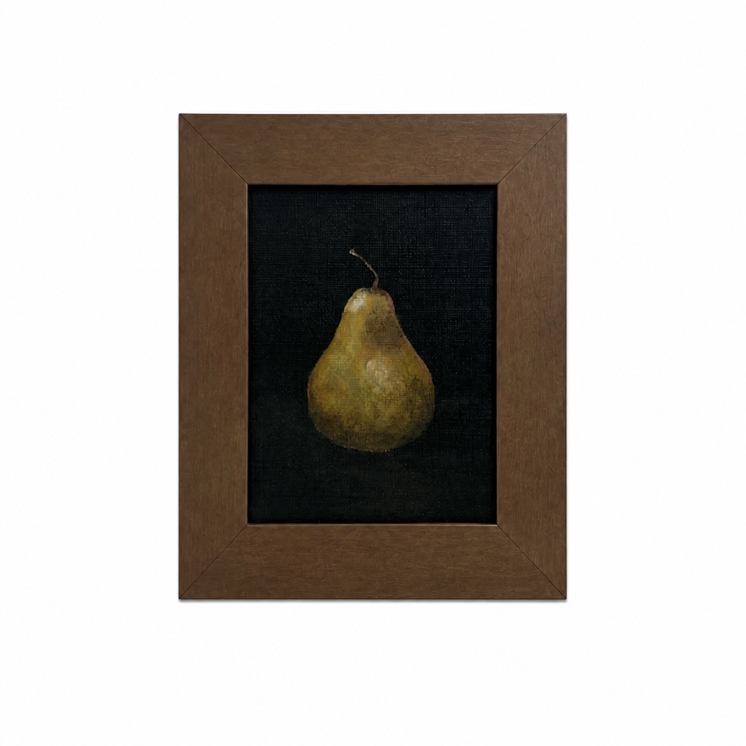 Framed artwork of a pear on a black background