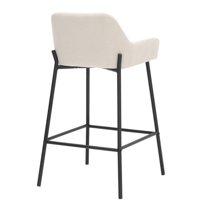 Bar stool with beige seat and black metal frame on a white background