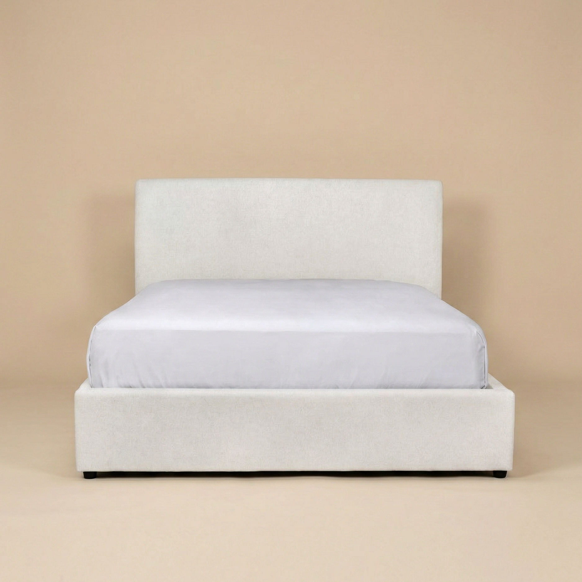 Full front view of the Vivienne upholstered platform bed in cream fabric featuring a modern low-profile design.