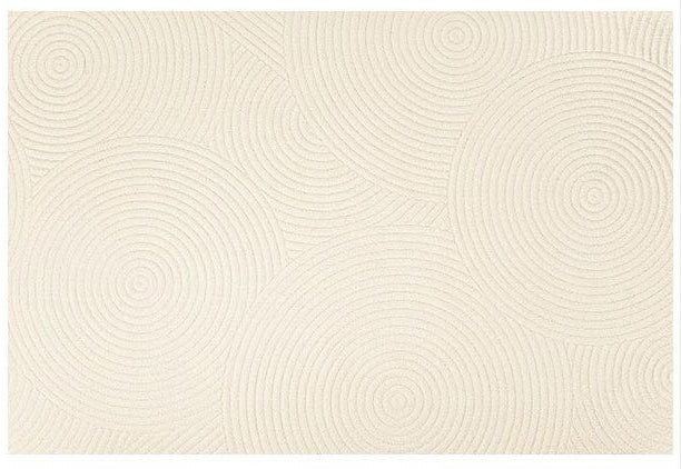 Zen Circles Rug featuring textured circular patterns in a soft beige tone