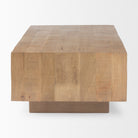 Side profile view of the Aero block coffee table showing the thick solid wood construction and straight lines.