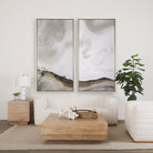 The Aero square coffee table styled in a minimalist living room with a white sofa, neutral rug, and large abstract art.