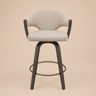 Bar stool with beige cushioned seat and dark wooden legs on a beige background